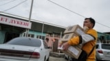 Kazakhstan. A man walks through the market in the city of Zharkent, Zhetysu region. March 19, 2024