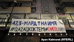 Kazakhstan - Banner on Nursultan Nazarbayev street in Almaty. 