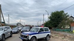 Автомобиль полиции на улице в Талапкере.